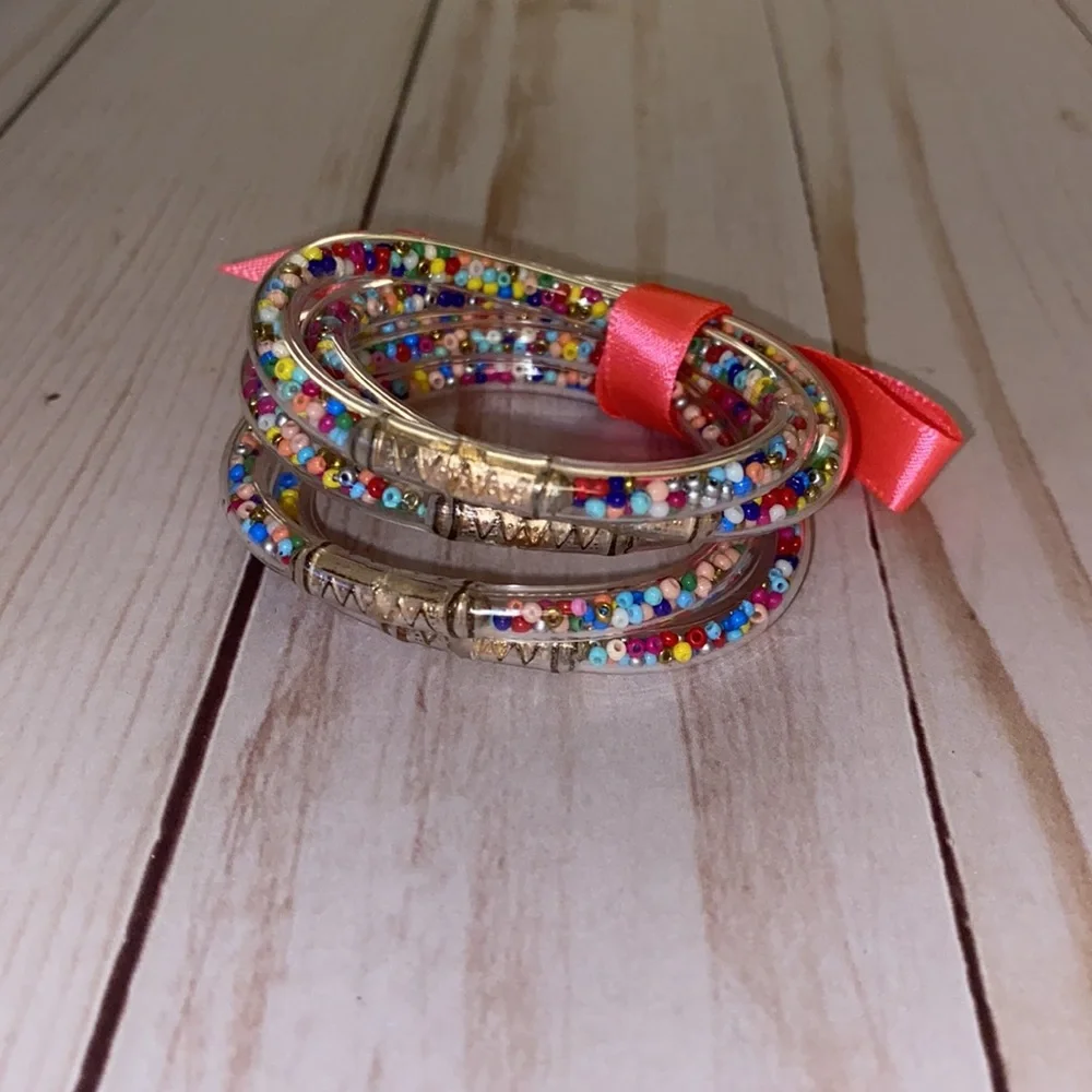 Little girls clear multi colored confetti plastic bracelets